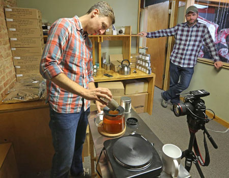 Brandon Friedman, left, and Terrence Kamauf make tea at the offices of Rakkasan Tea Company in Deep Ellum. Rakkasan is derived from the Japanese word for parachute, and is the nickname of their regiment within the U.S. Army's 101st Airborne Division.
(Louis DeLuca/Staff Photographer)