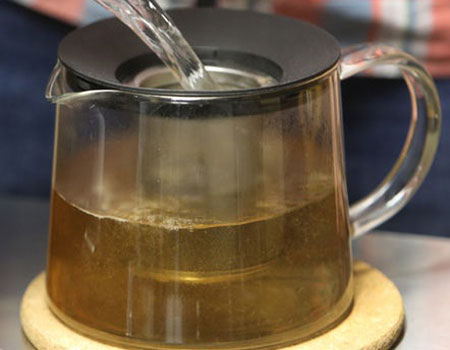 Friedman makes a pot of Himalayan Golden Tips tea at Rakkasan Tea Company in Deep Ellum.
(Louis DeLuca/Staff Photographer) 