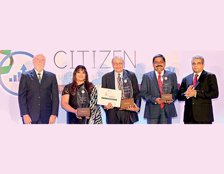 The three winners Ceylon Biscuits (centre), 1st runner up Aitken Spence (second from left) and 2nd runner up (Commercial Bank) with Ceylon Chamber of Commerce Chairman Dr. Hans Wijayasuriya and UNDP Resident Representative Robert Juhkam