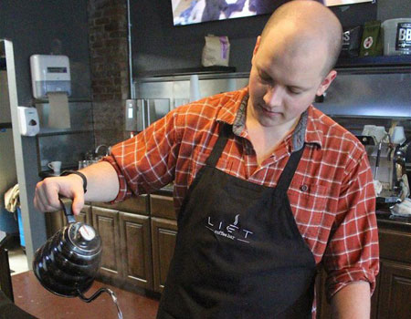 Grant D. Crawford | Daily Press

Noah Scearce prepares an hibiscus tea at Lift Coffee Bar in downtown Tahlequah.