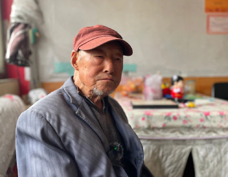 Wang Shikang, 89, once carried bricks of tea across the mountains of Sichuan to Tibet. “I have rheumatism in my knees and back,” he says of the physical toll it took.
    