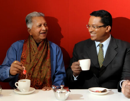 Father and son, Merrill and Dilhan Fernando, enjoying a cuppa in Sydney in 2013. 
