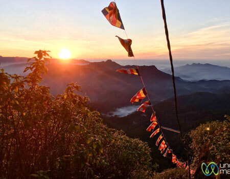 Sunrise at the top of Adam's Peak, a sacred place for Buddhists, Hindus, Muslims and Christians.