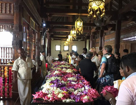 Flower offerings at the Temple of the Relic of the Tooth. Kandy, Sri Lanka.