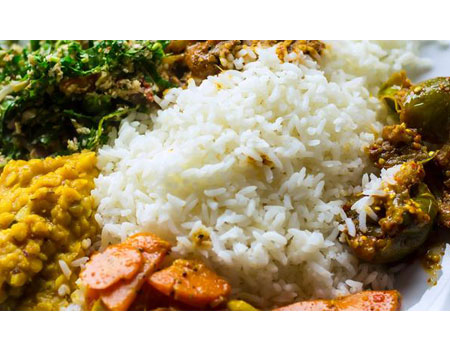PHOTO: Traditional Sri Lankan dish of boiled rice, curry of fish and vegetables. (Photo via iStock / Getty Images Plus / DavorLovincic)