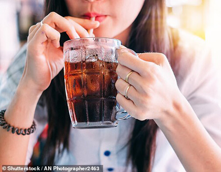 Drinking one serving of soda a day increases diabetes risks by 18 percent - but substituting one non-sugary drink can cut risks by to to 10 percent, Harvard scientists said (file) 
