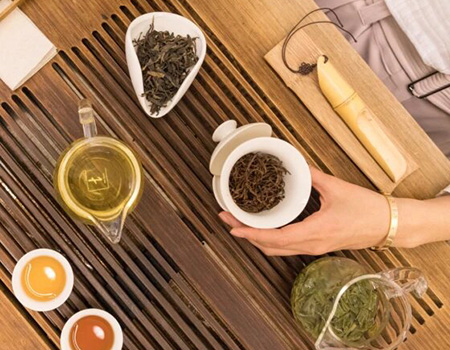 Teng's looseleaf teas handpicked and harvested from China's historic tea mountains are brewed and poured out for guests.