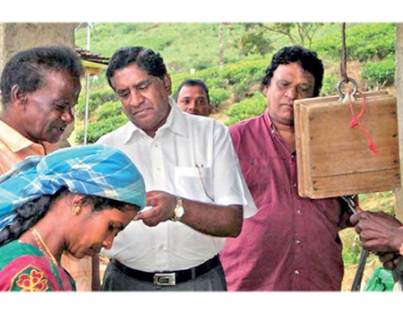 Yogarajan listening to the problems of tea plantation workers
