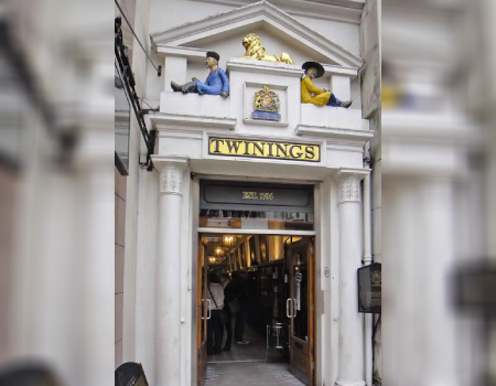 Twinings tea shop established 1707, respected purveyor of dry tea since 1717. Note the two Chinese men and the golden British lion that adorn the entrance. Source: Wikimedia Commons